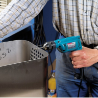Ударная дрель Makita HP 1620